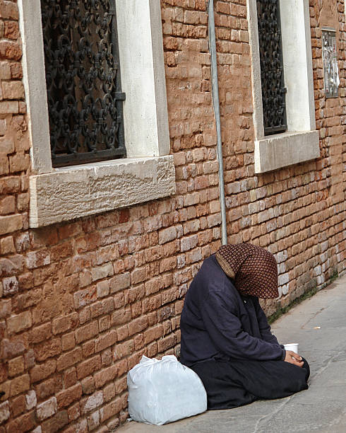 Homeless woman stock photo