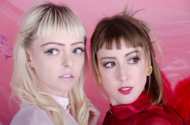 istock Two nervous young women as worried cherubs. 463427127