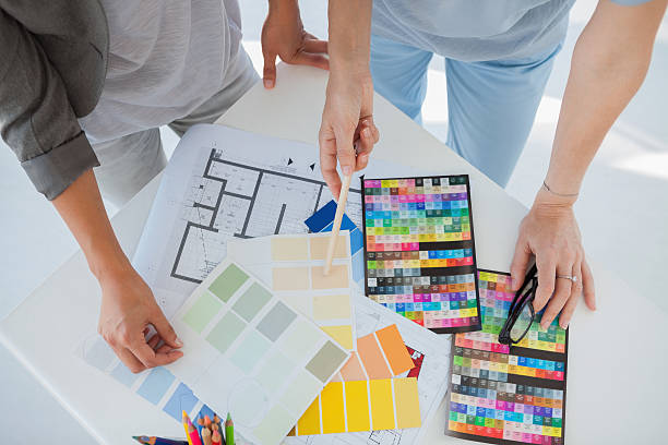 istock Hands of interior designers working on colour samples 463428853