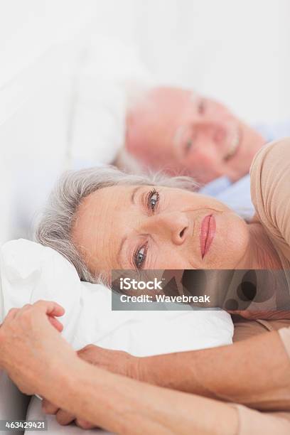 Happy Couple Waking Up Stock Photo - Download Image Now - 1980-1989, 70-79 Years, Adult