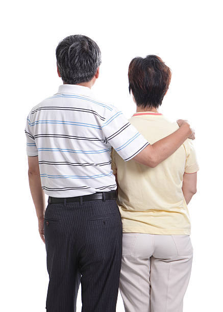 istock seniors couple look to empty copy space 463429491