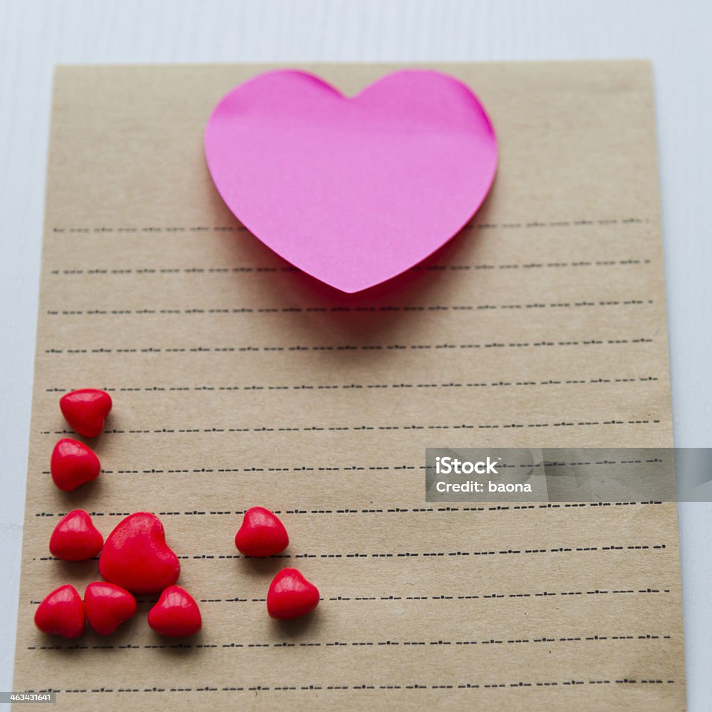 Candy hearts Group of candy hearts on notepad. Adhesive Note Stock Photo