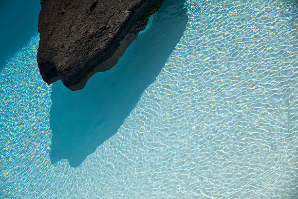 Detail of swimming pool and volcanic rocks in Lanzarote, Canary islands, Spain.