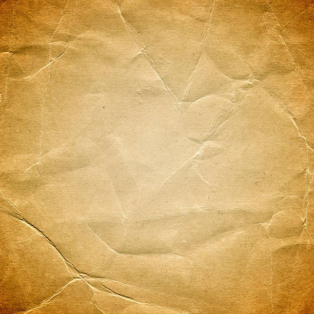 istock Grunge brown paper textured background 463432163