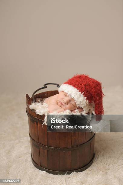 Newborn Sleeping In Antique Bucket Stock Photo - Download Image Now - Antique, Bucket, Christmas