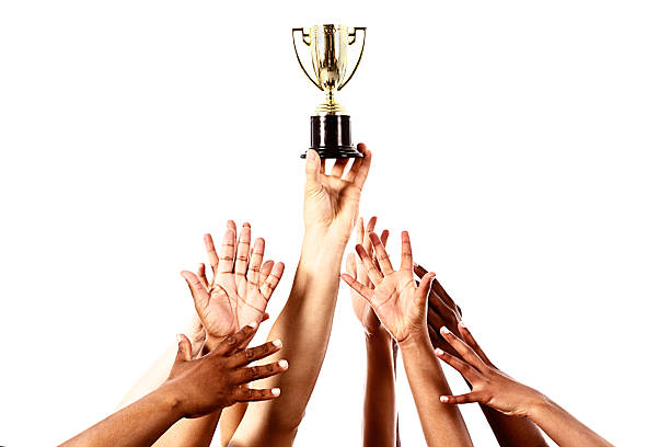 istock I want to win! Many hands compete for trophy 463432597