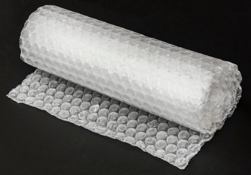 Bubble wrap on charcoal card.