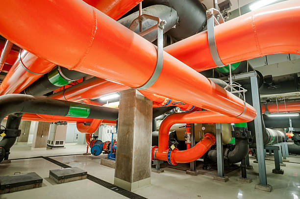 Water pumping station with industrial size pipes Water pumping station, industrial interior and pipes  . chiller hvac equipment photos stock pictures, royalty-free photos & images