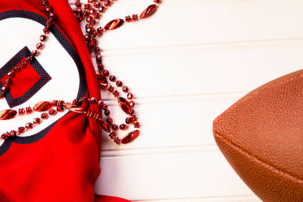 istock Sports:  Football and jersey on white background. 463441055