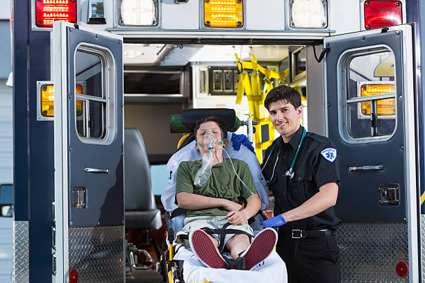 istock Paramedic with child on stretcher 463441197