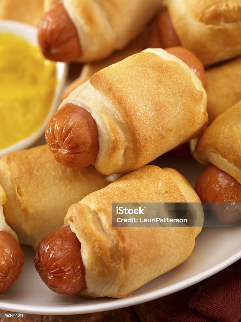 Pigs in a Blanket Mini Hotdogs Wrapped in Bread Dough and Baked Served with Mustard-Photographed on Hasselblad H3D2-39mb Camera Appetizer Stock Photo