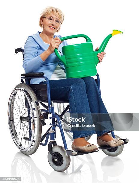 Mature Woman In Wheelchair Stock Photo - Download Image Now - 60-69 Years, Active Seniors, Adult