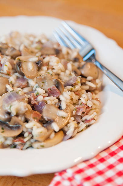 istock Risotto with mushrooms and bacon 463453437