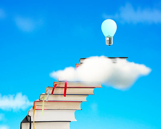 istock Stack of books through cloud with growing blub and sky 463455565