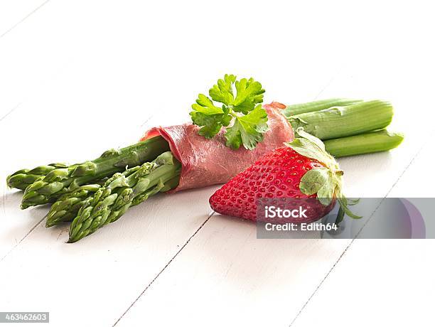 Green Asparagus With A Strawberry Stock Photo - Download Image Now - Asparagus, Boiled, Food and Drink
