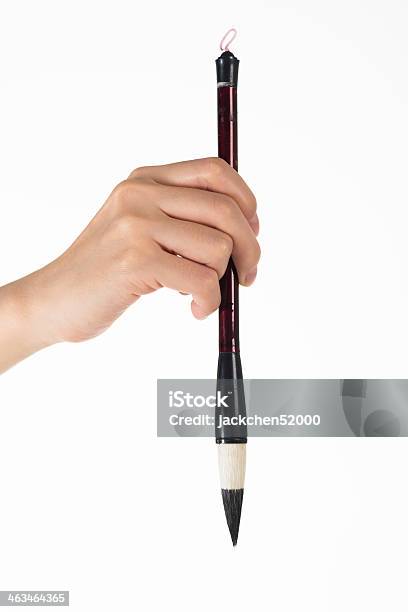 Writing Brush In Mans Hand Stock Photo - Download Image Now - Hairbrush, Chinese Script, Brushing