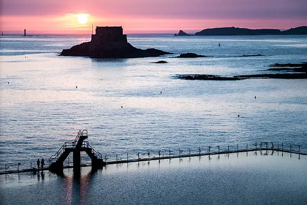 Petit Bé fort and seawater pool at sunset, viewed from Saint Malo walls.