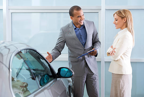 istock African American salesperson with his customer. 463491741