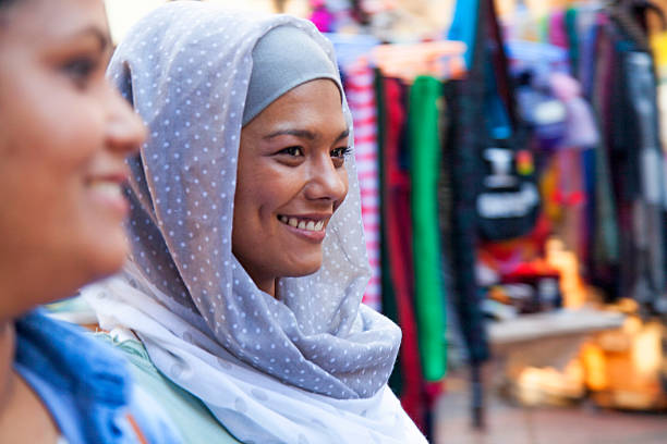 istock Muslim woman looking away smiling 463495023