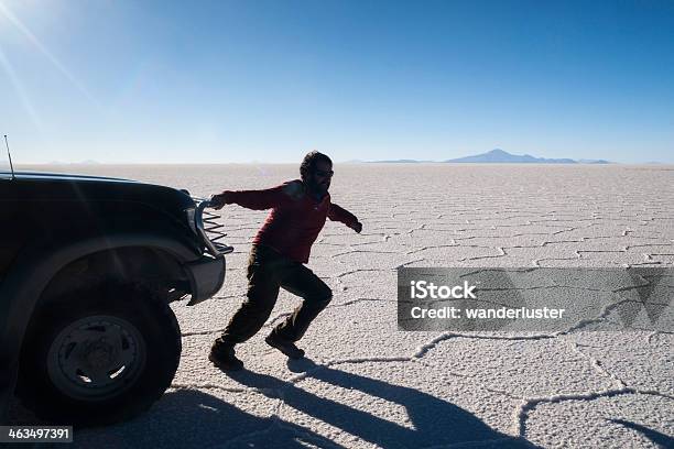 Man Pulls Truck In Desert Stock Photo - Download Image Now - Pick-up Truck, Adult, Adults Only