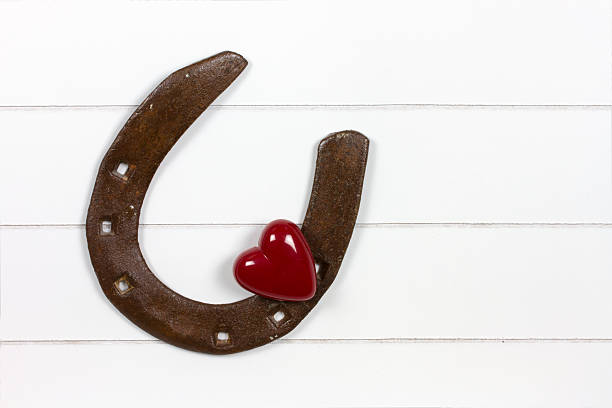 istock horse shoe with heart symbol 463505817