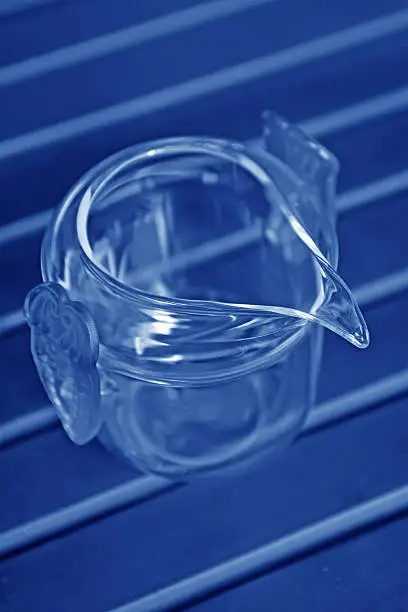 brown glass cup on a desk