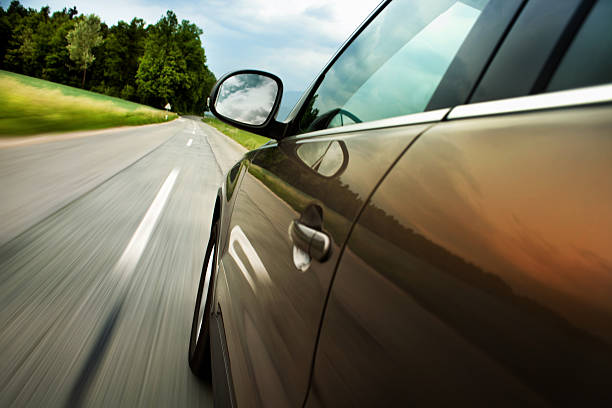 istock speeding car on country road 463518975