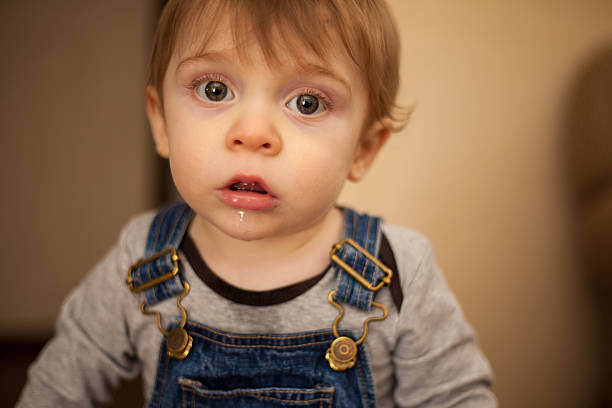 istock Funny little kid drooling a bit 463519141