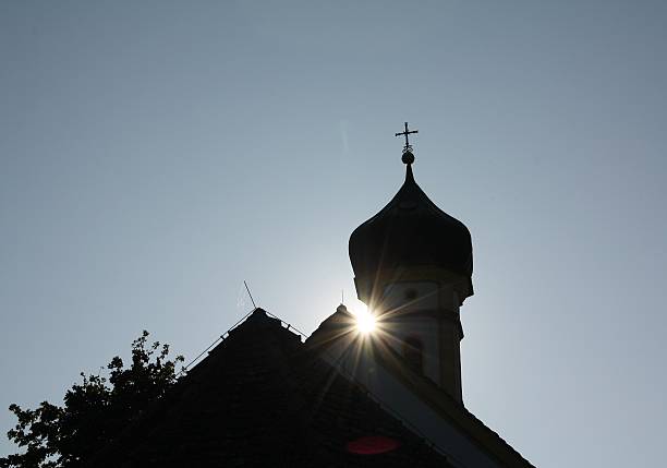 Sunset over a church, serene