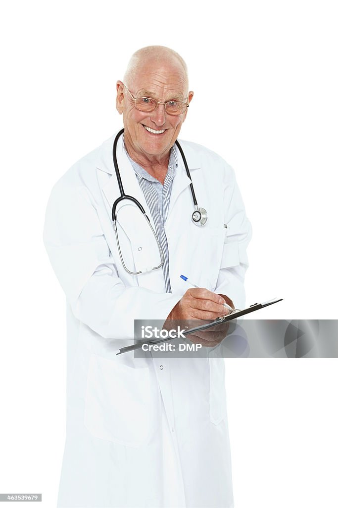 Happy senior male doctor with a clipboard Portrait of happy senior male doctor with a clipboard smiling at you against white background 60-69 Years Stock Photo