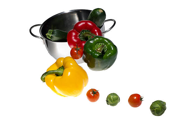 istock mixed colorated peppers on white background 463547379