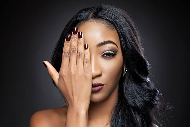 istock Black beauty with elegant curly hair 463553539