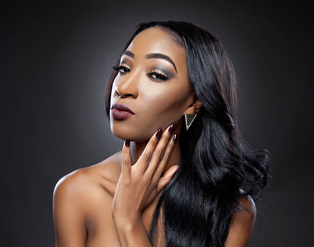 istock Black beauty with elegant curly hair 463562477