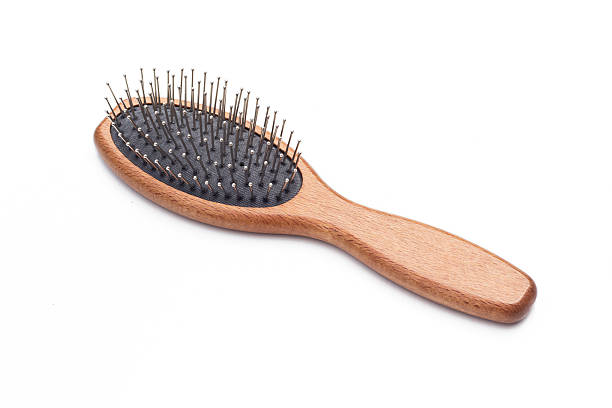 istock Wood hairbrush isolated on white background 463576247