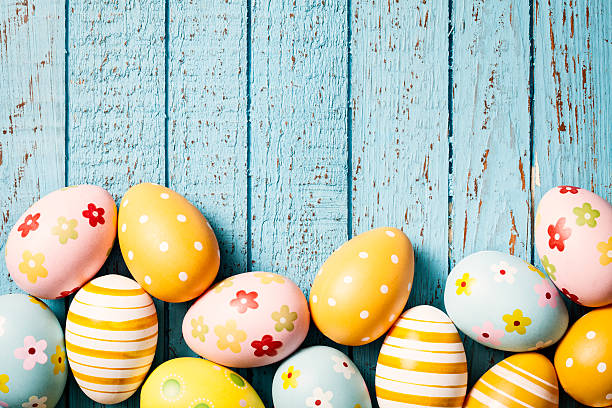 istock Easter Eggs on Old Blue Wood - Season Background 463581679
