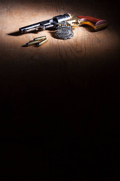 istock Revolver And Deputy Marshal's Badge 463586389