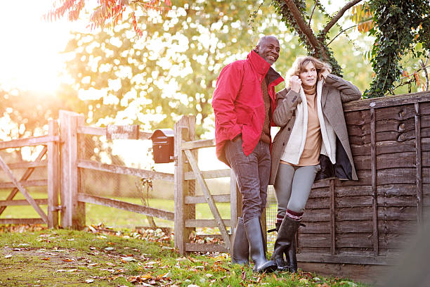 istock happy mature couple posing in garden 463586969