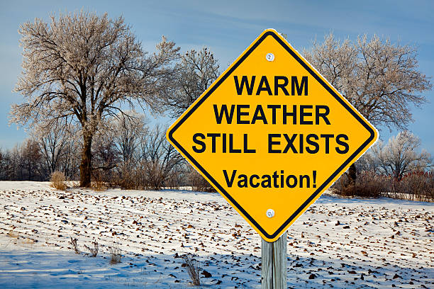 istock Warm Weather Still Exists, Vacation Road Sign 463587067