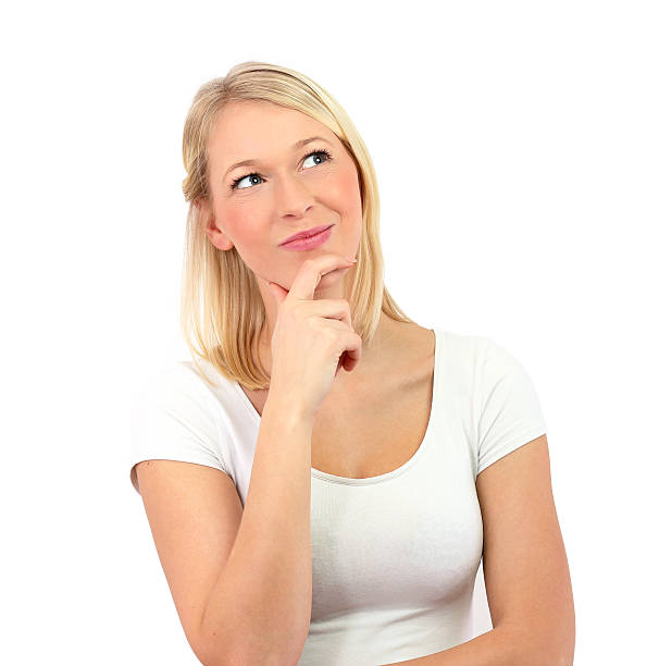 istock Blonde girl looking up thinking isolated 463587331