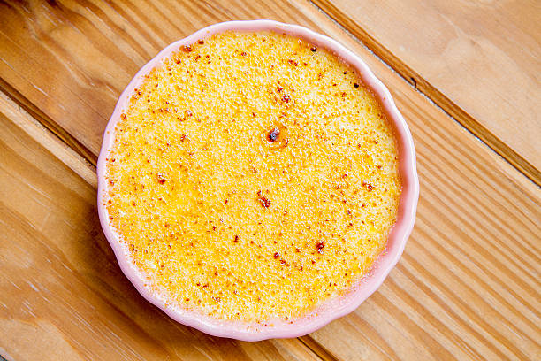 istock Cream Brulee on wood background 463589887