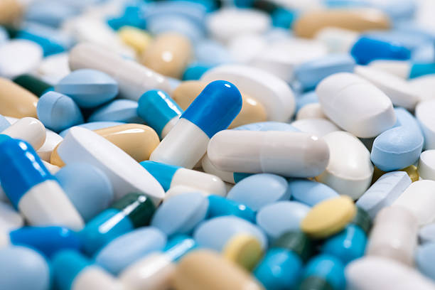Medicine pills Heap of medicine pills. Close up of colorful tablets and capsules capsule medicine photos stock pictures, royalty-free photos & images