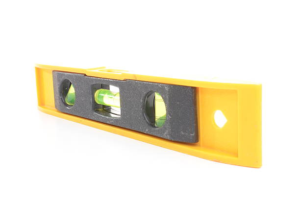 istock Yellow spirit level isolated on white 463613027