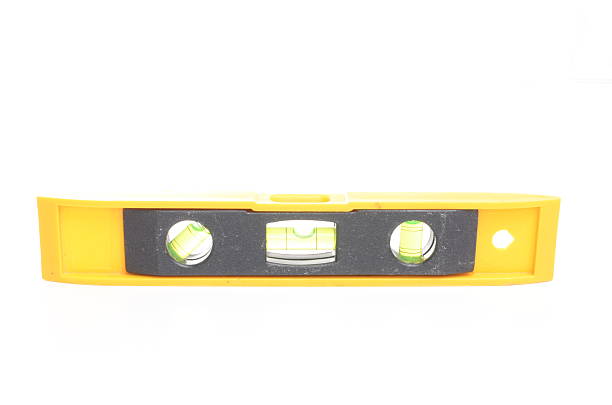 istock Yellow spirit level isolated on white 463613073