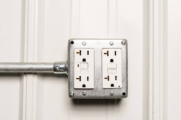 Electrical Outlet With Conduit Electrical outlet in a pole shed with conduit three pin plug stock pictures, royalty-free photos & images