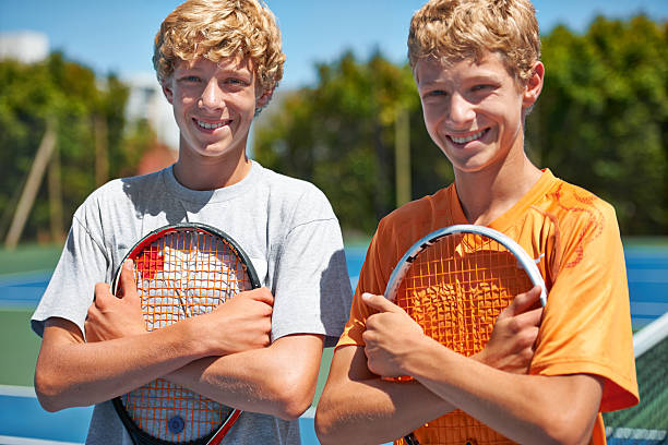 futuro doppio campioni da uomo - tennis child teenager childhood foto e immagini stock