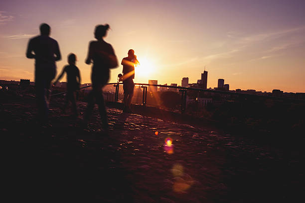 istock People in front of city skyline 463624155