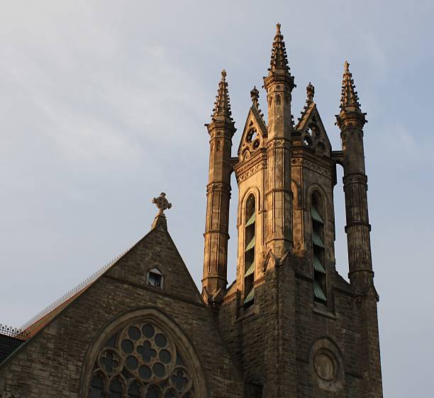 istock Church Steeple at sun rise with clear sky 463626953
