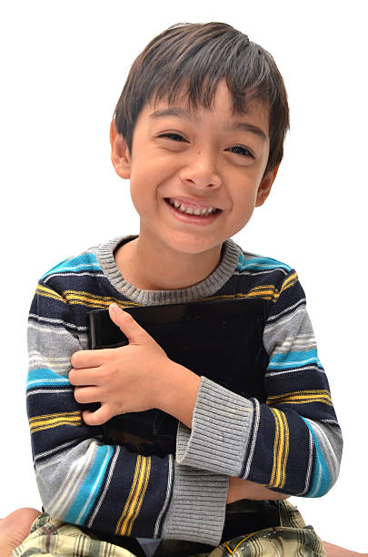 istock Happy little boy with tablet 463629907