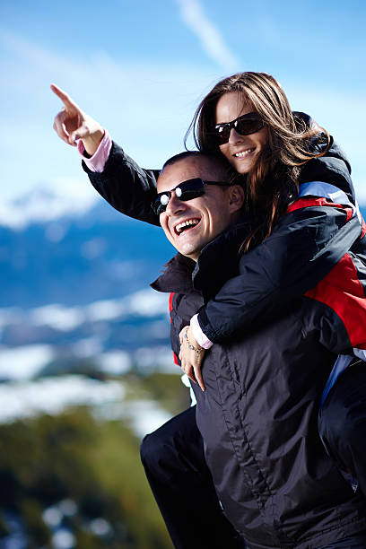 istock Happy couple enjoying a piggyback ride 463631777