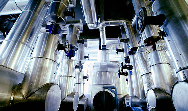 istock Equipment, cables and piping as found inside of a plant 463633029